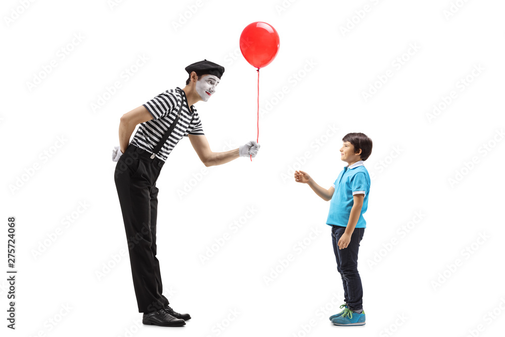 Mime giving a red balloon to a little boy Stock Photo | Adobe Stock