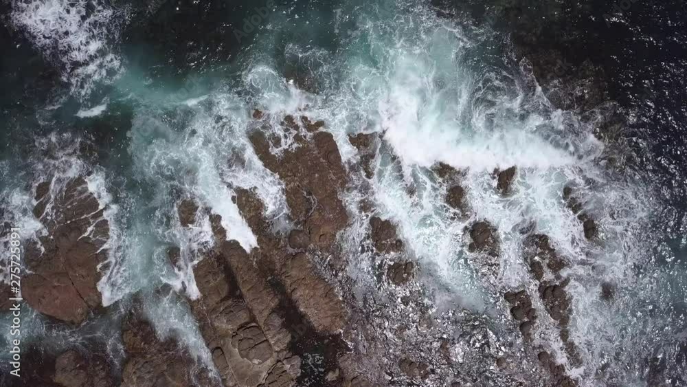 top view of the mighty waves of the Indian ocean shattering against the rugged rocks of Busselton autralia top view of the mighty waves of the Indian ocean shattering against the rugged rocks of Busselton autralia