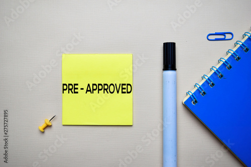 Pre - Approved text on sticky notes with office desk concept