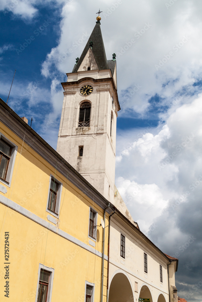 Tower of the Church of St. Giles & the Virgin Mary Royal in the old town of Trebon, Czech Republic