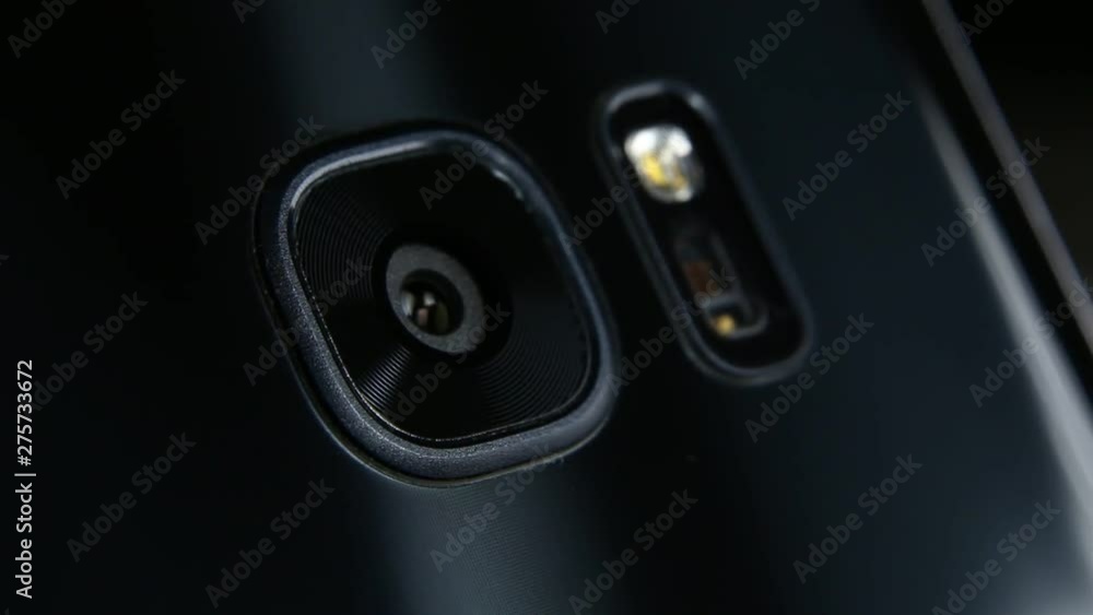 Macro close up of a smartphone camera lens on back Macro close up of a smartphone camera lens on back
