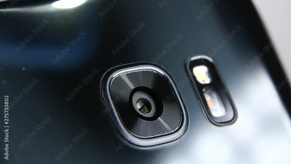 Macro close up of a smartphone camera lens on back Macro close up of a smartphone camera lens on back