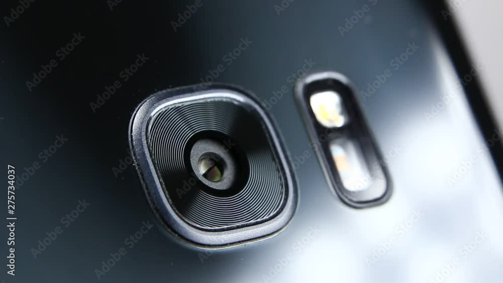 Macro close up of a smartphone camera lens on back Macro close up of a smartphone camera lens on back