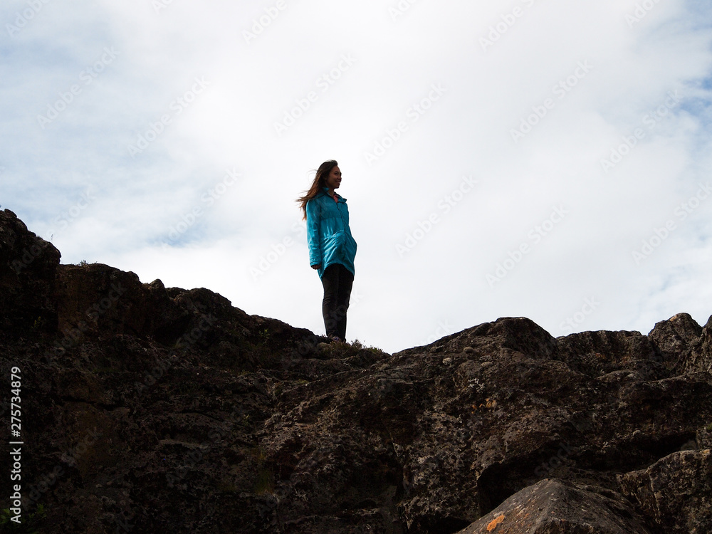 Girl Standing at the Edge