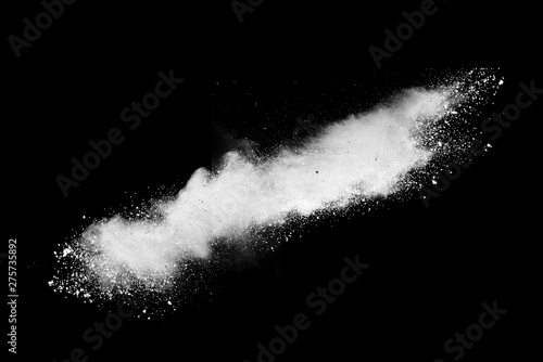 White powder explosion on black background. 