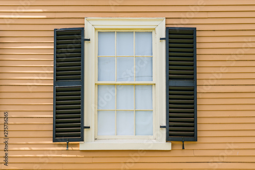 Old Historic Window Exterior with Shutters