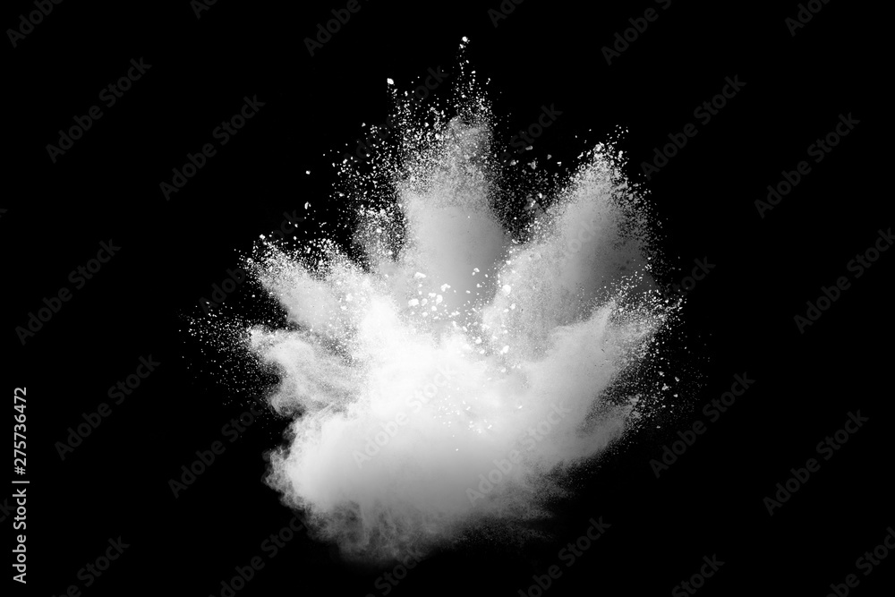 Freeze motion of white color powder exploding on dark background.  - obrazy, fototapety, plakaty 