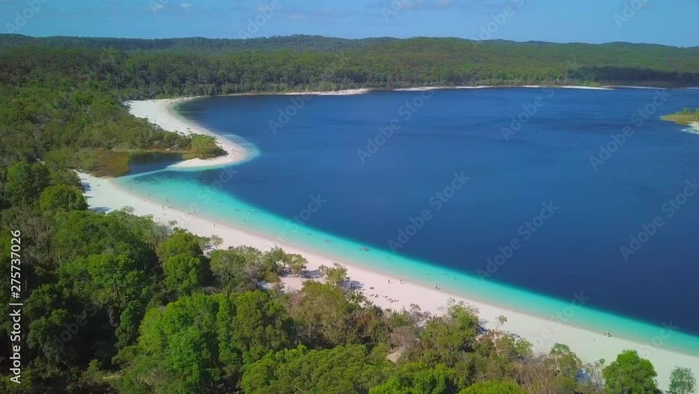 Aerial Forward: Amazing Beach Between Bright Blue Ocean and Lush Green Forest , Fraser Island, Australia Aerial Forward: Amazing Beach Between Bright Blue Ocean and Lush Green Forest , Fraser Island, Australia