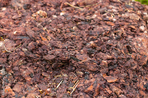 A pile of brown mulch