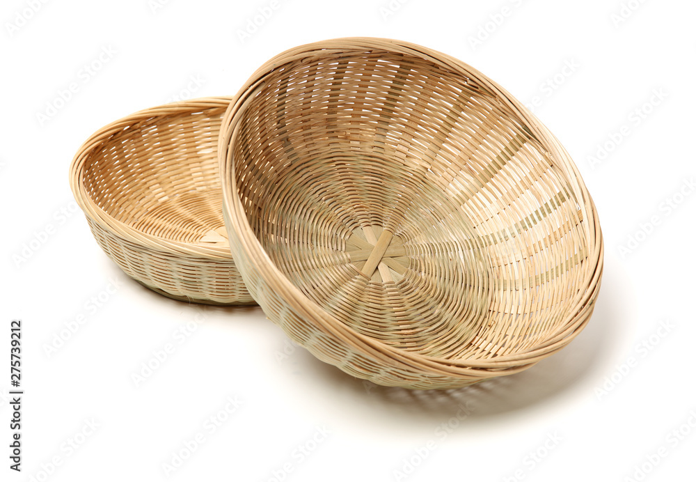 Fototapeta premium Bamboo basket hand made isolated on white background. Woven from bamboo tray.