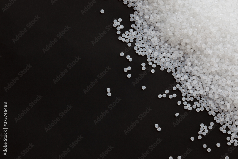 Close-up of plastic polymer granules, polymer plastic, polymer pallet, Plastic ball.