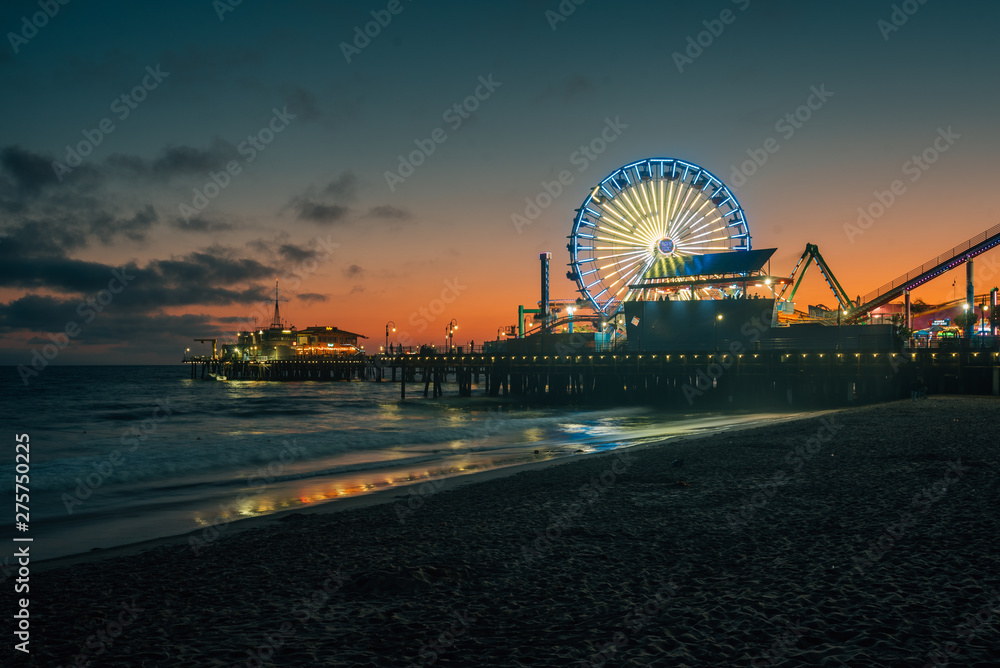The Santa Monica pier at sunset, in Los Angeles, California