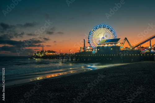 The Santa Monica pier at sunset, in Los Angeles, California © jonbilous