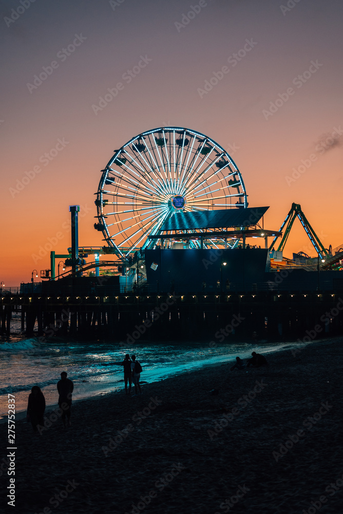 The Santa Monica pier at sunset, in Los Angeles, California