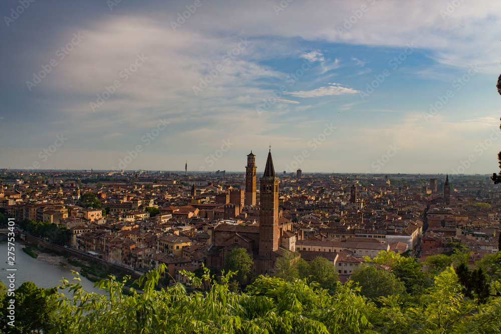 Basilica of Santa Anastasia and Lamberti Tower with Adige River, Verona, Italy. View from above.