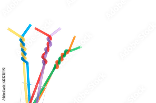 Twisted drinking straws on white. Straws in LGBT rainbow colors on white. © Azazello