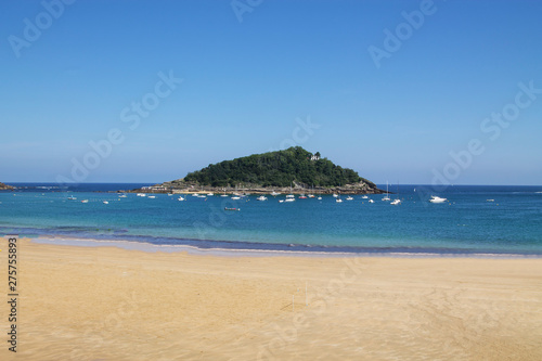 Clear Santa Island in La Concha Bay, San Sebastian, Basco Country, Spain