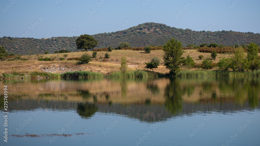 Lac de Padula - reflections in the lake. Corsica, France Lac de Padula - reflections in the lake. Corsica, France