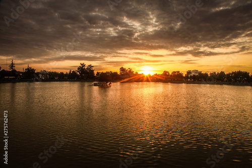 sunset over the lake © rezadanial
