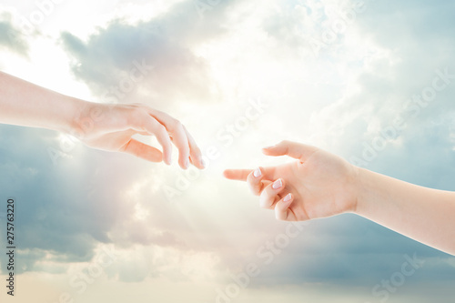 Hands and heaven. Helping, giving and taking hand