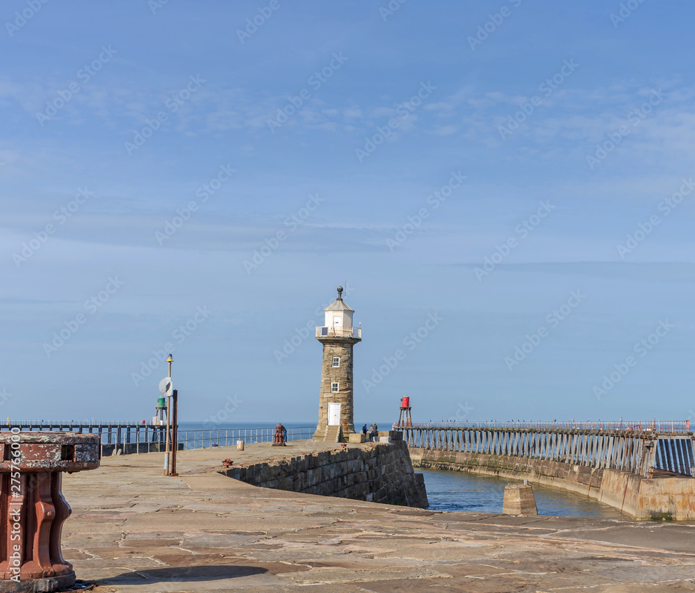 Whitby lighthouse and pier.