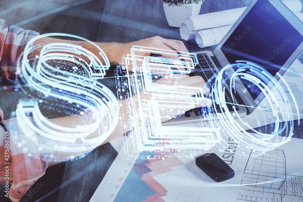 Multi exposure of seo icon with man working on computer on background. Concept of search engine optimization. Multi exposure of seo icon with man working on computer on background. Concept of search engine optimization.