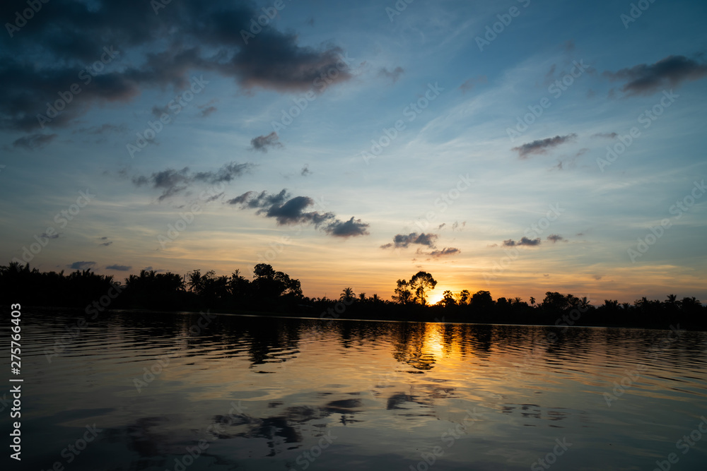 Obraz premium Beauty sunset at the river