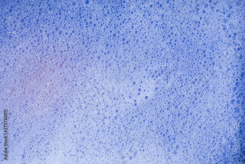 Soap bubbles background- suds liquid