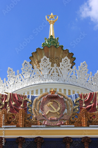 Soviet Union Gerb with Hammer and sickle on decorative building facade 