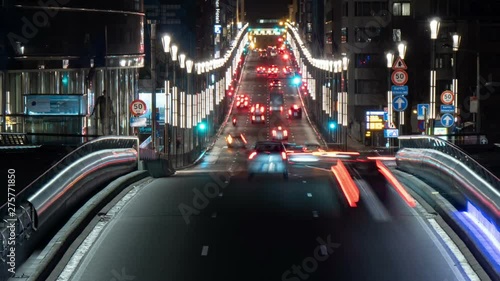 Colorful highway with riding cars in Brussels at night in spring in timelapse 