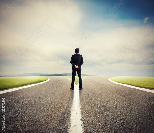 Choices of a businessman at a crossroads. Concept of decision