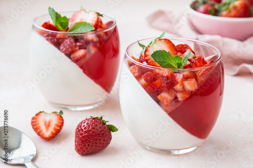  strawberry and vanilla cream jelly dessert with fresh berry