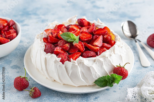 Delicious Pavlova cake with fresh strawberry photo
