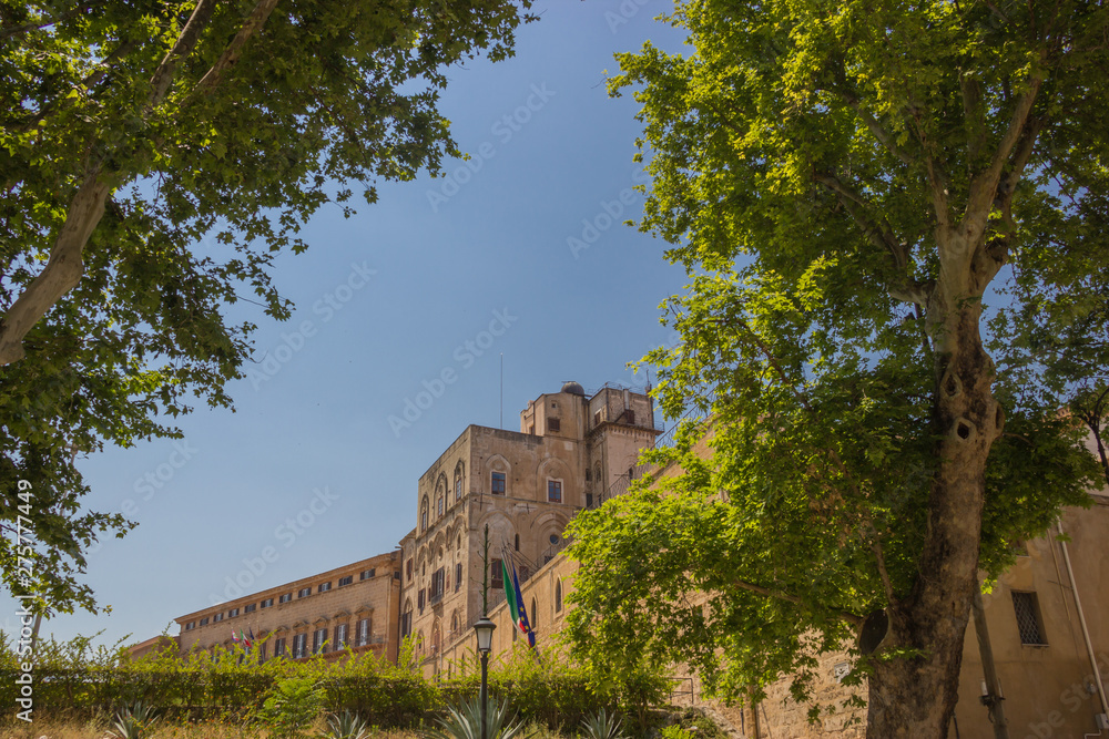 Fototapeta premium Norman palace of Palermo Sicily, view from side of the royal palace complex with trees of the garden