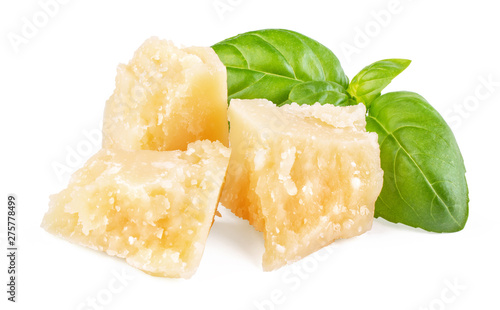 Three slices of permesan reggiano and basil bush isolated on white background, macro shooting, front view