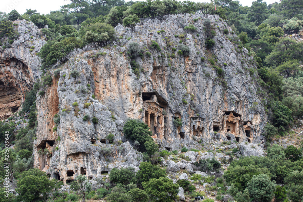 Ancient city of Kaunos, Dalyan valley, Turkey. Kaunos (Latin: Caunus) was a city of ancient Caria and in Anatolia, a few km west of the modern town of Dalyan, Muğla Province, Turkey.