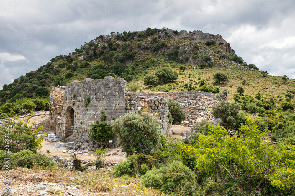 Ancient city of Kaunos, Dalyan valley, Turkey. Kaunos (Latin: Caunus) was a city of ancient Caria and in Anatolia, a few km west of the modern town of Dalyan, Muğla Province, Turkey. Ancient city of Kaunos, Dalyan valley, Turkey. Kaunos (Latin: Caunus) was a city of ancient Caria and in Anatolia, a few km west of the modern town of Dalyan, Muğla Province, Turkey.