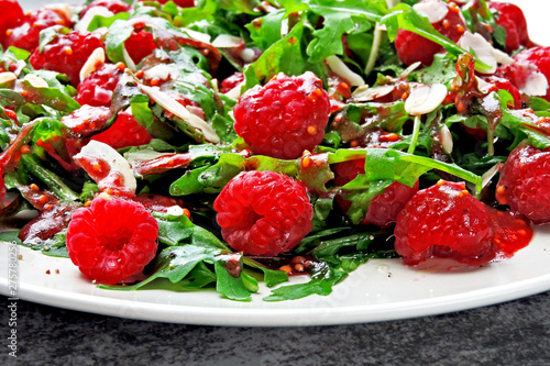 Fitness salad with arugula and raspberry