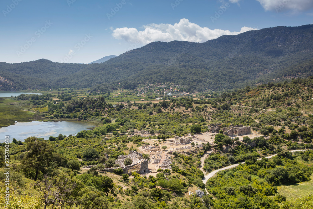 Ancient city of Kaunos, Dalyan valley, Turkey. Kaunos (Latin: Caunus) was a city of ancient Caria and in Anatolia, a few km west of the modern town of Dalyan, Muğla Province, Turkey. Ancient city of Kaunos, Dalyan valley, Turkey. Kaunos (Latin: Caunus) was a city of ancient Caria and in Anatolia, a few km west of the modern town of Dalyan, Muğla Province, Turkey.