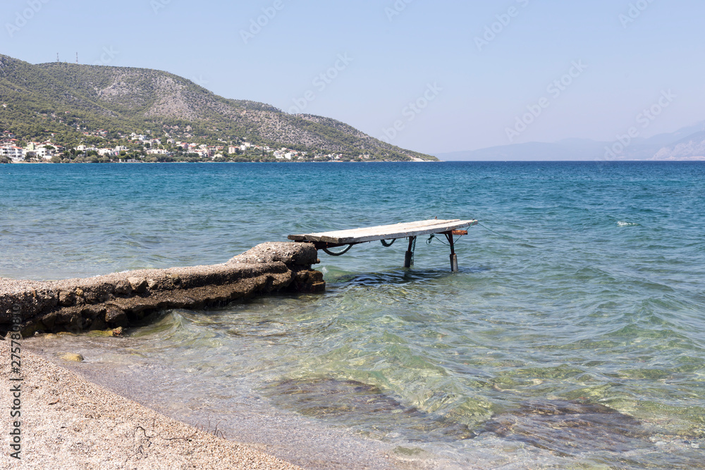 Old berth and boat (Greece, island Salamis)