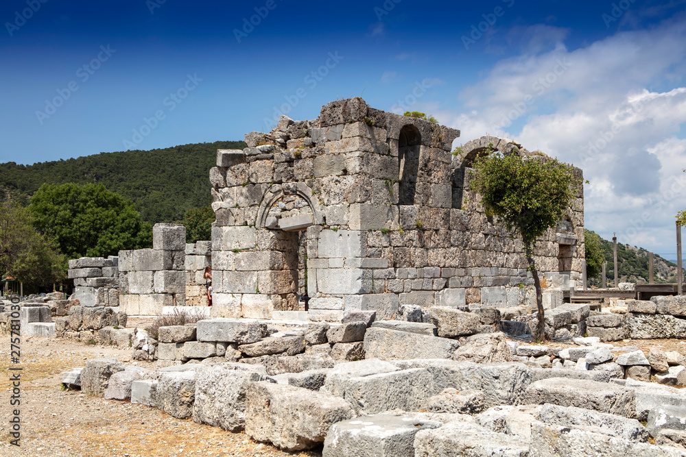 Ancient city of Kaunos, Dalyan valley, Turkey. Kaunos (Latin: Caunus) was a city of ancient Caria and in Anatolia, a few km west of the modern town of Dalyan, Muğla Province, Turkey.