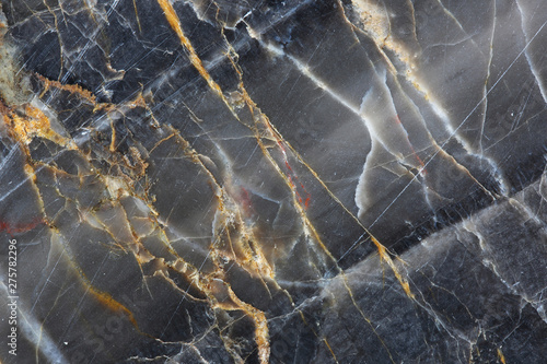 Gold,yellow and white patterned of dark gray marble pattern (Gold Russia) for texture background and design product.