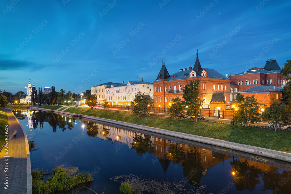 Oryol, Russia. View of Orlik river embankment at dusk with old historic buildings