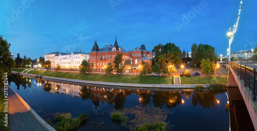 Oryol, Russia. Panorama of Orlik river embankment at dusk with old historic buildings