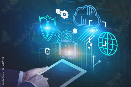 Wallpaper Mural Man with tablet, cyber security interface Torontodigital.ca