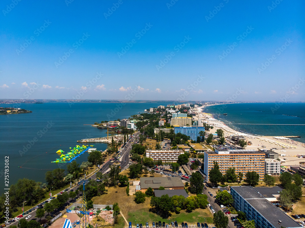 Aerial view of Mamaia in Constanta, popular tourist place and resort on black sea in a Romania. At one side of this place is located lake, and at other side is a Black Sea.