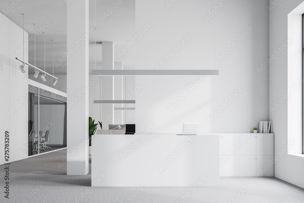 White reception desk in office interior White reception desk in office interior