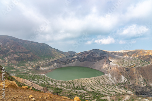 Beautiful view of Okama crater lake at Mount Zao in summer sunny day. active volcano in Miyagi Prefecture  Japan