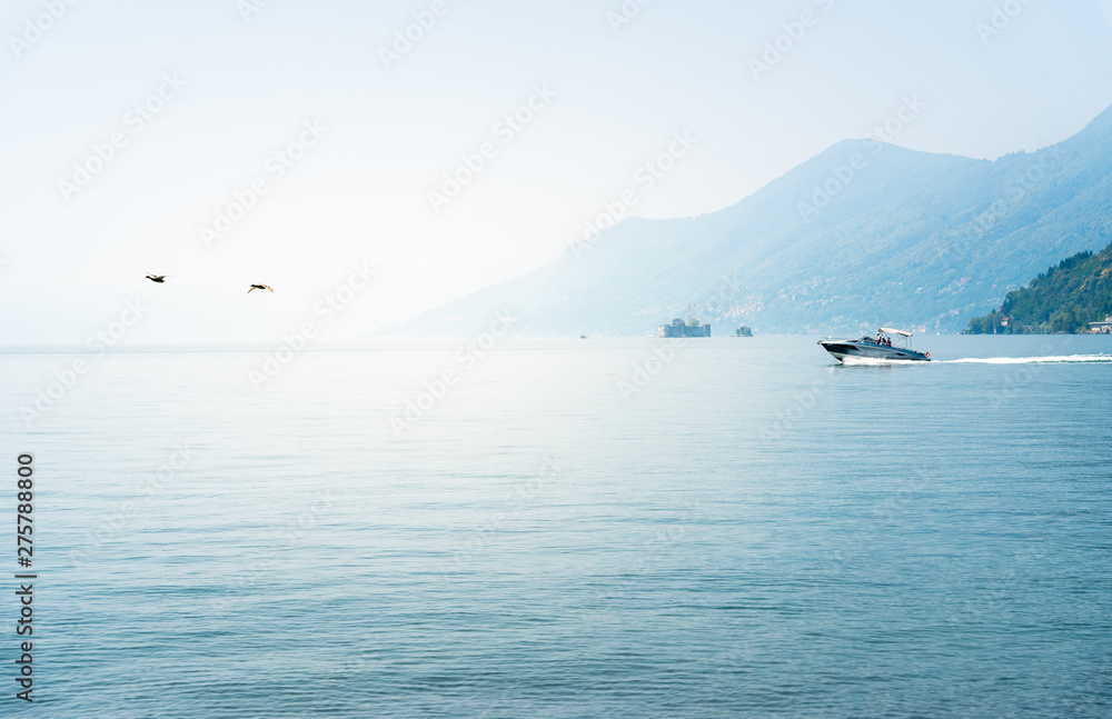 Landscape of lake Maggiore on a hot foggy day Landscape of lake Maggiore on a hot foggy day