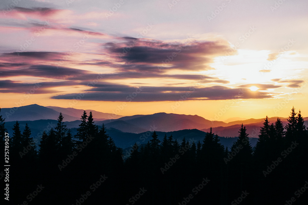Beautiful peaceful mountains at the sunset in summertime